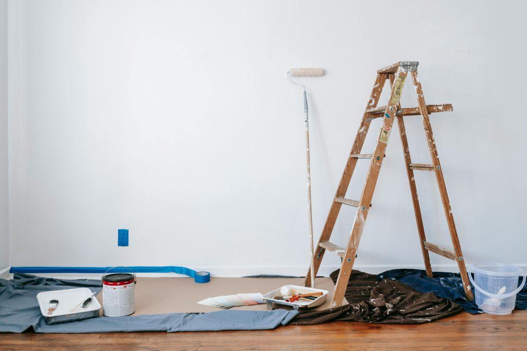 A ladder and tolls for painting a wall on the floor - Contact Phaselectric.com. 